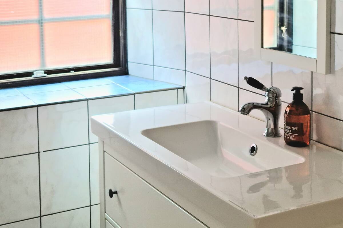 family room | bathroom | shower, hair dryer, towels