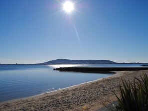 On the beach, sun loungers