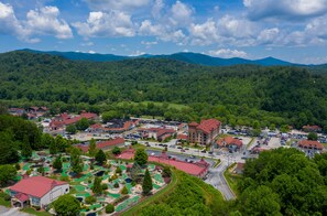 Experience the heart of the mountain town at this vibrant community center, surrounded by lush hills and a well-maintained green space.