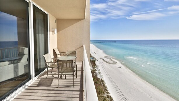 A balcony with a view of a beach and ocean. - Tidewater 1011 10th Flr 2BR+Bunks 3BA Early Booking Discounts 2 Beach Chairs (Panama City Beach)