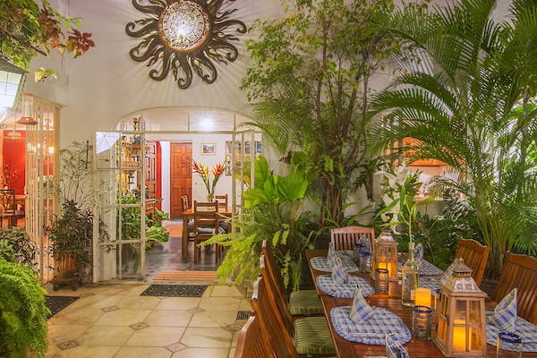 PATIO INTERIOR from the pool/Jacuzzi, background kitchen/living room