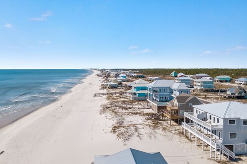 Updated, gorgeous 4 bedroom gulf front duplex with interior connecting door.