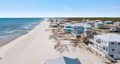 Updated, gorgeous 4 bedroom gulf front duplex with interior connecting door.