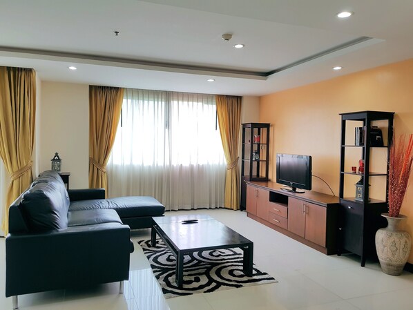 2 Bedrooms Family Condo | Living room | 42-inch flat-screen TV with cable channels, TV