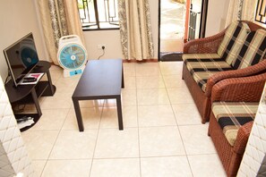 Standard Double Room | Living room | 32-inch TV with satellite channels