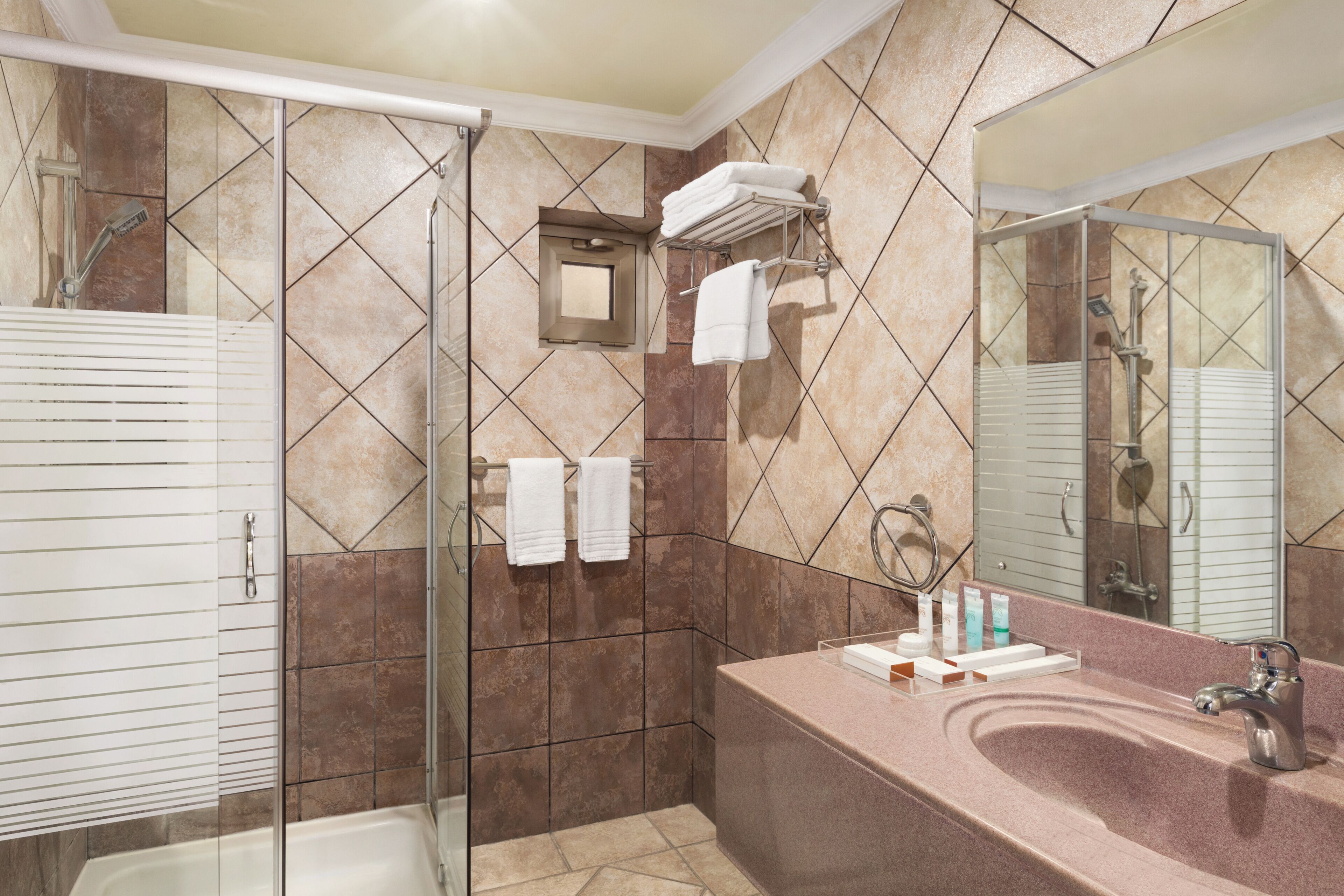 business suite, 1 king bed, non smoking | bathroom | shower, free toiletries, hair dryer, bathrobes