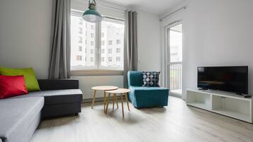 Deluxe-Apartment | Wohnzimmer | Flachbildfernseher, Netflix