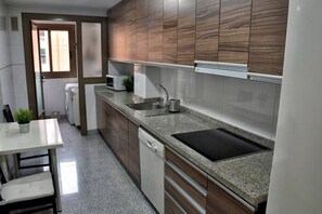 Microwave, stovetop, dishwasher, coffee/tea maker