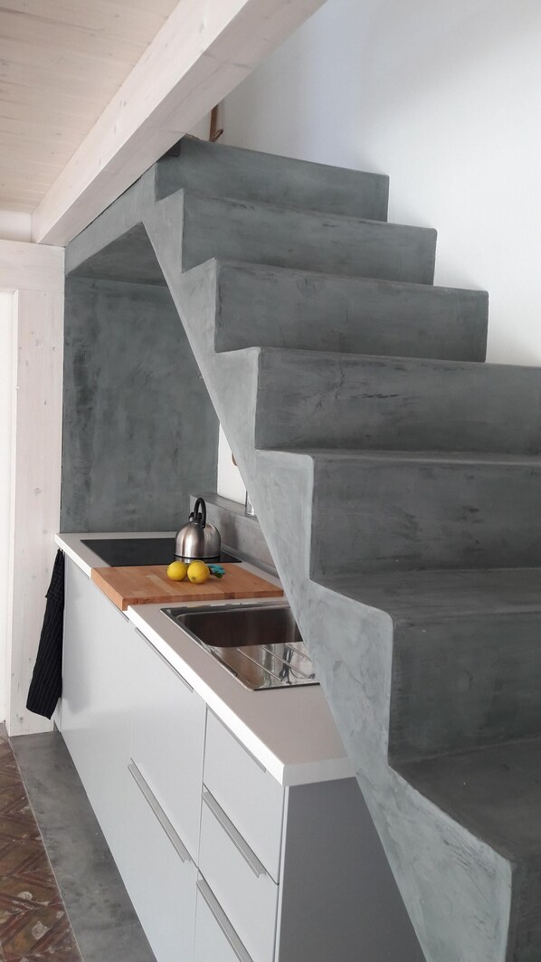 Fridge, stovetop, coffee/tea maker, toaster