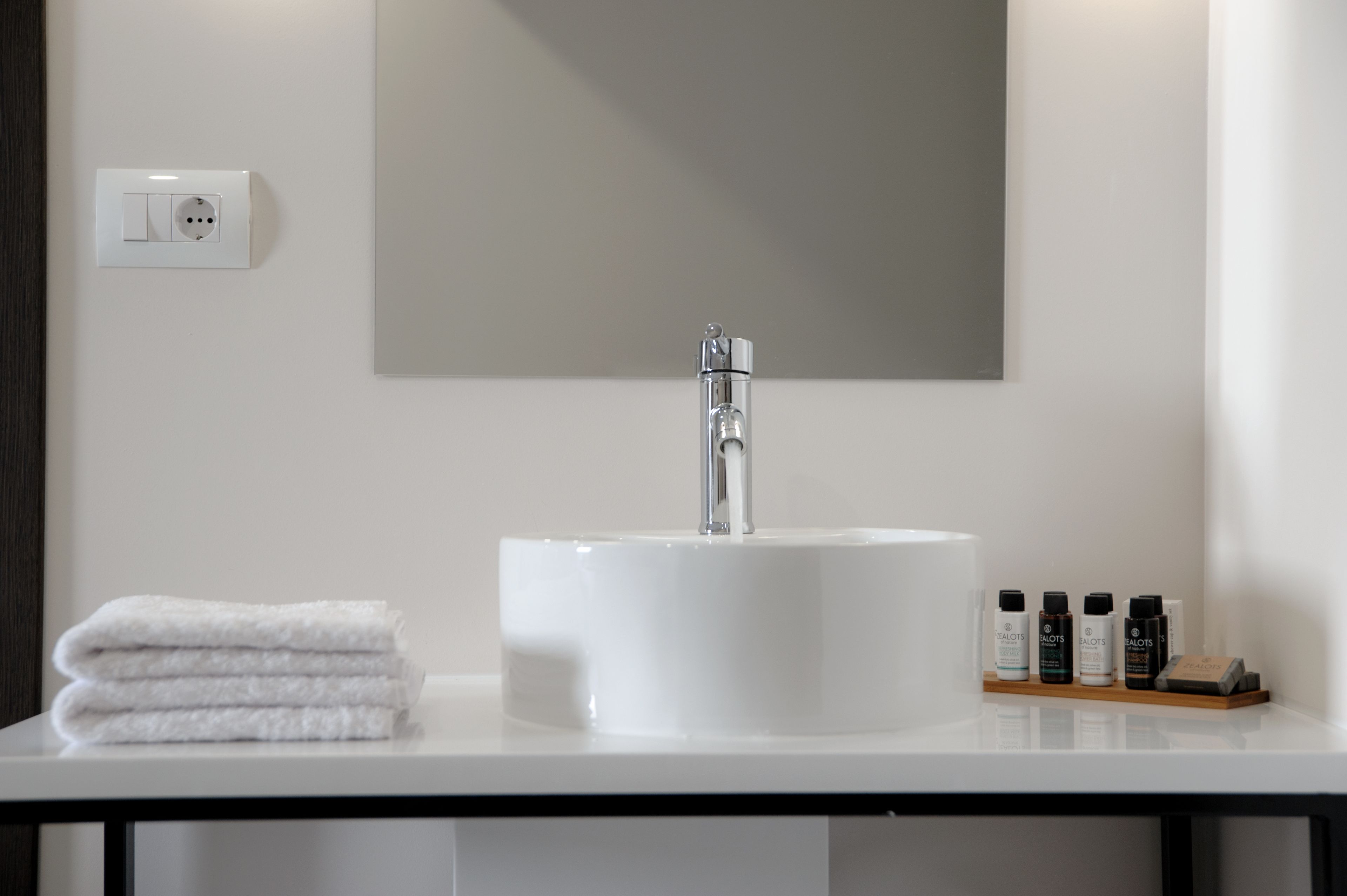 shower, eco-friendly toiletries, hair dryer, slippers