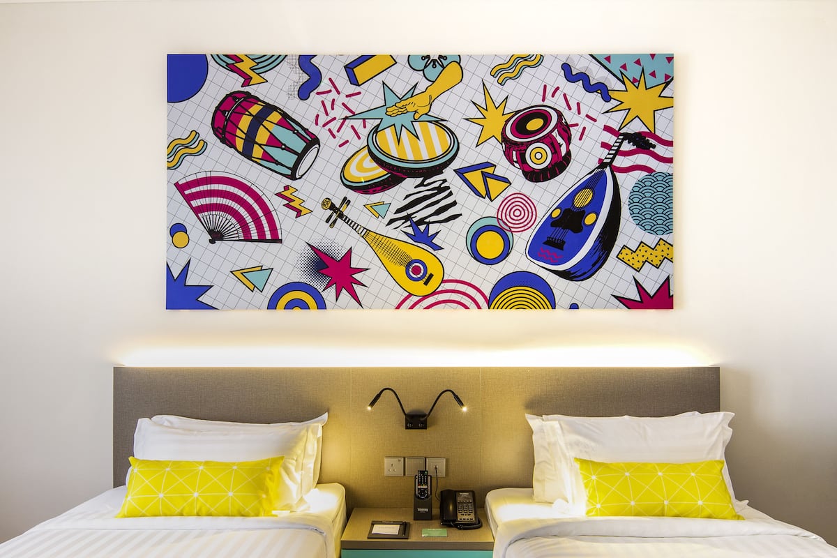 Standard Twin Room | Minibar, in-room safe, desk, iron/ironing board