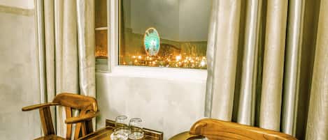 Deluxe Double Room, City View | Living area | Flat-screen TV