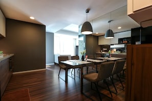 Deluxe Apartment, 2 Bedrooms | Living area | LCD TV