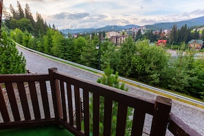 Superior Chalet, Sauna | Balcony view - Bukovel Hotel (Bukovel)