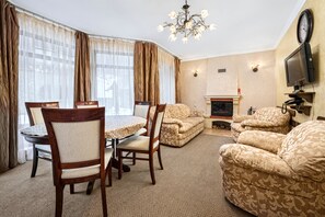 Deluxe Chalet, Sauna | Living room | TV - Bukovel Hotel (Bukovel)