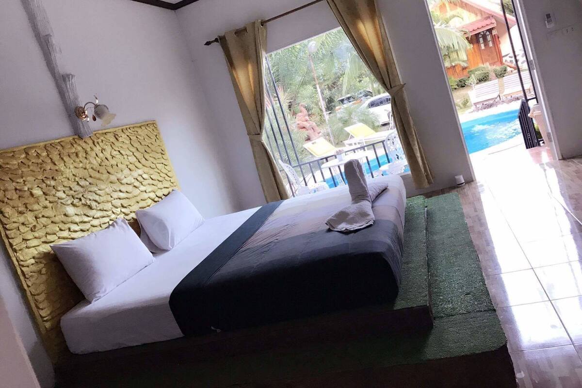 Deluxe Room with Pool View | Rollaway beds, free WiFi