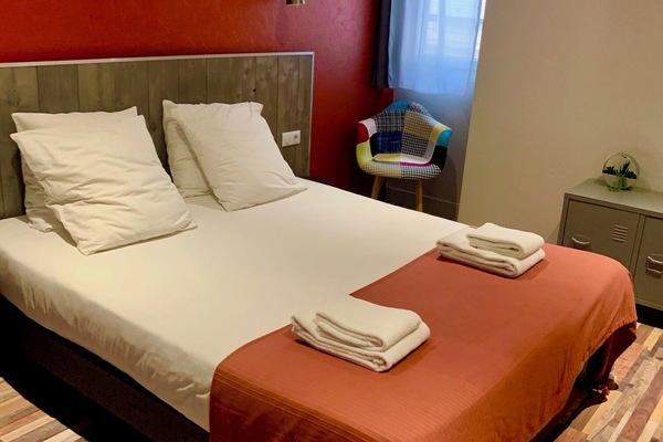 Premium bedding, desk, laptop workspace, blackout curtains