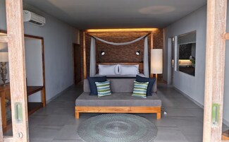 Luxury Suite, 1 King Bed, Ocean View, Oceanfront | Premium bedding, minibar, in-room safe, desk