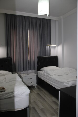 Egyptian cotton sheets, premium bedding, down comforters - Otel Orkun (Izmir)