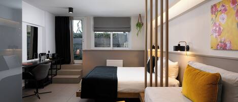 Sir Comfort Suite | Hochwertige Bettwaren, Zimmersafe, individuell dekoriert