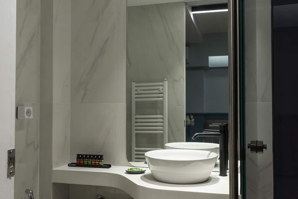 sir comfort suite | bathroom | shower, designer toiletries, hair dryer, bathrobes