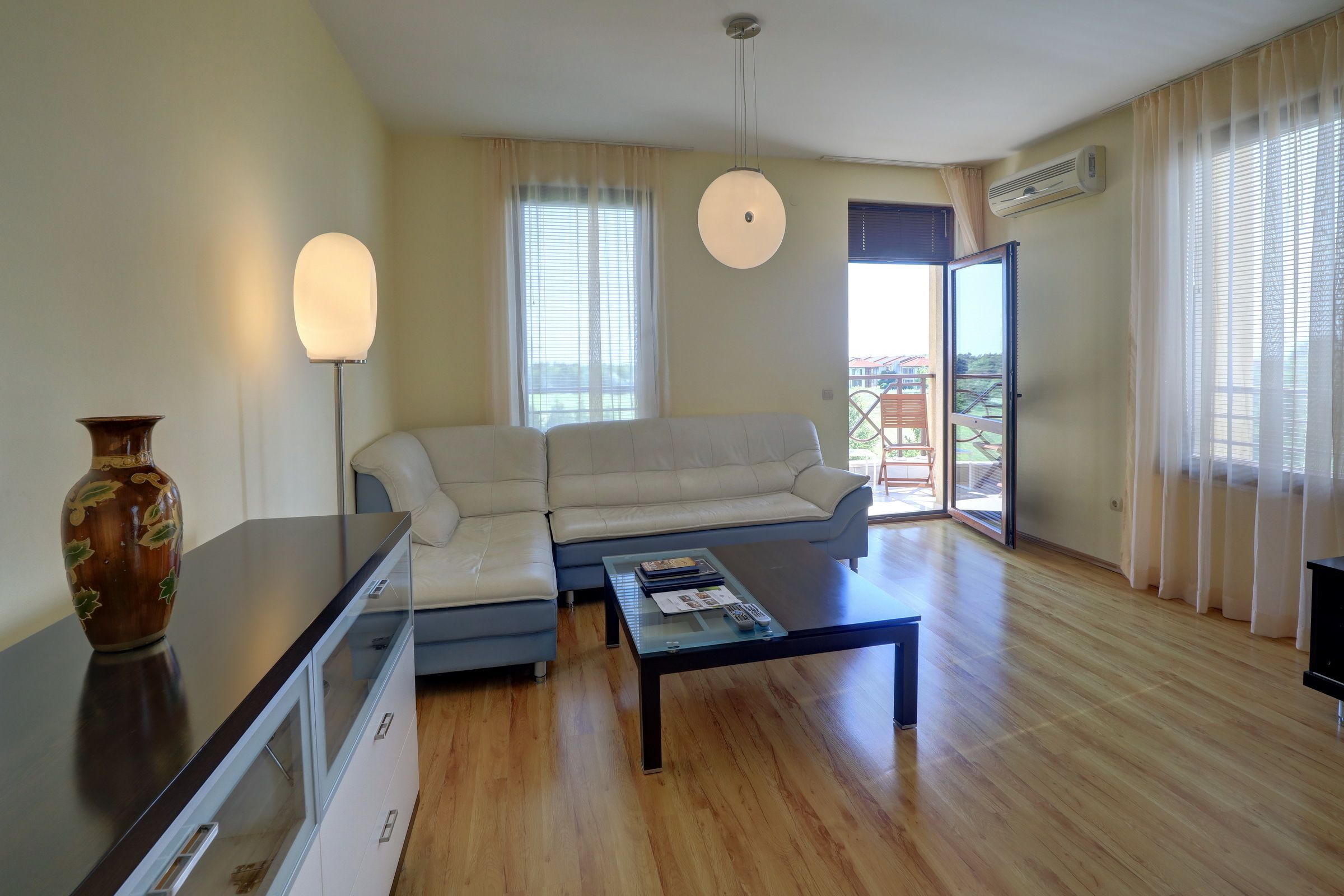 Classic Apartment, 2 Bedrooms, Balcony, Golf View | Living area | Flat-screen TV, DVD player