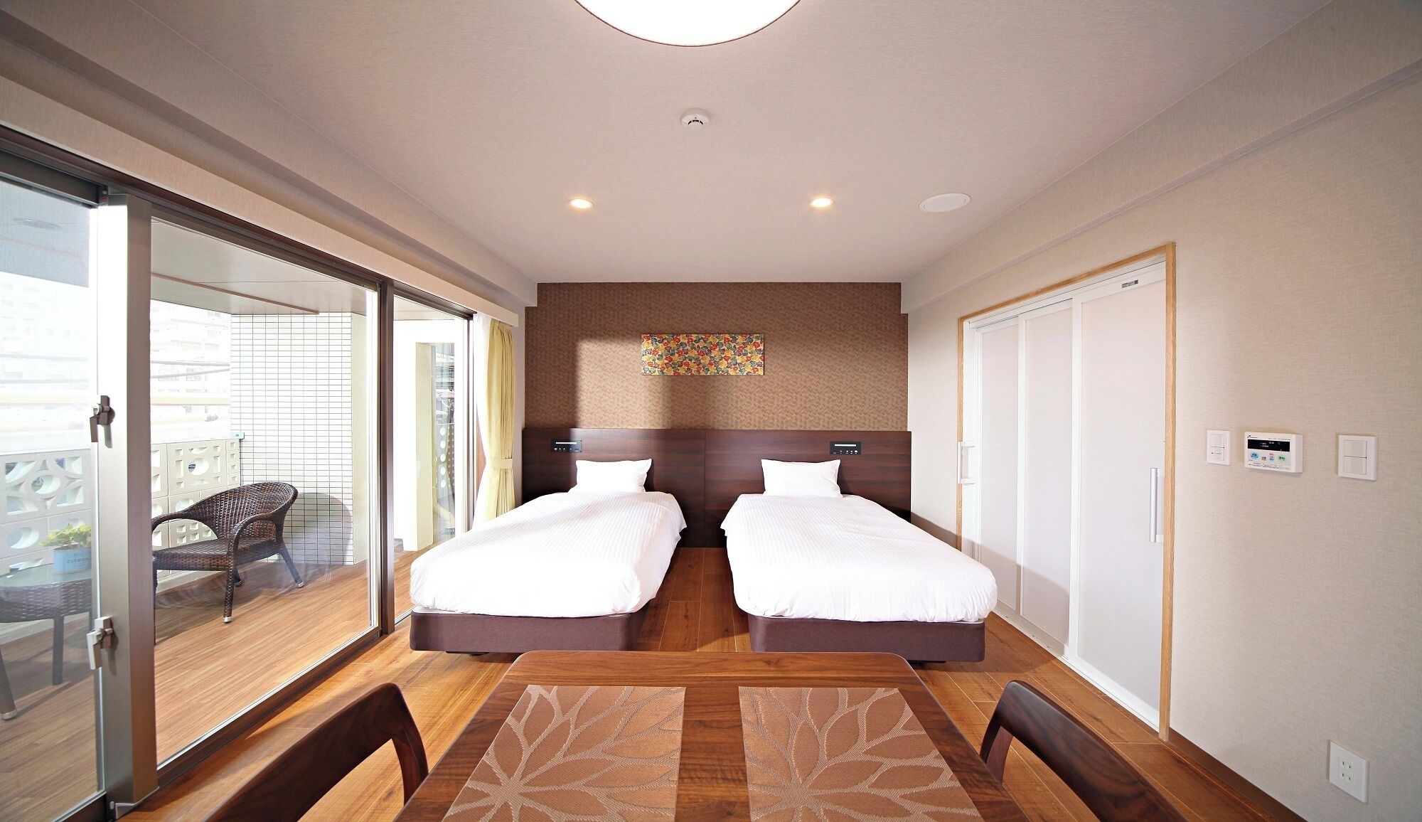 Premium bedding, memory foam beds, desk, laptop workspace