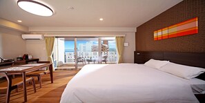 Premium bedding, memory foam beds, desk, laptop workspace