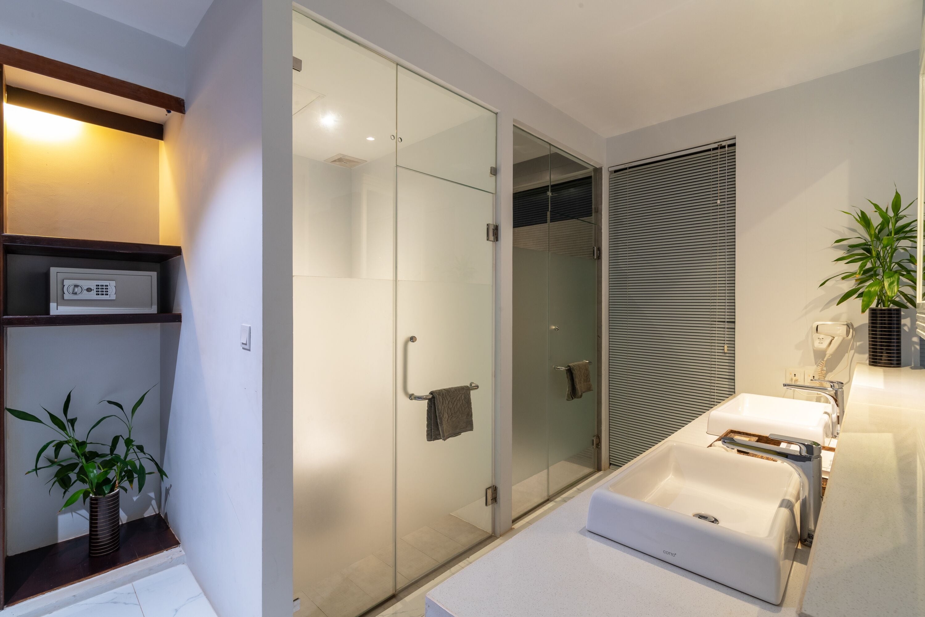 executive suite | bathroom | designer toiletries, hair dryer, bathrobes, slippers