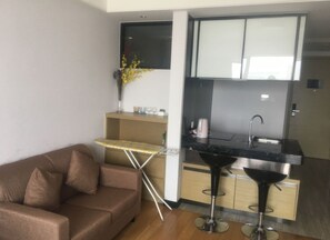 Apartamento luxo | Área de estar | TV