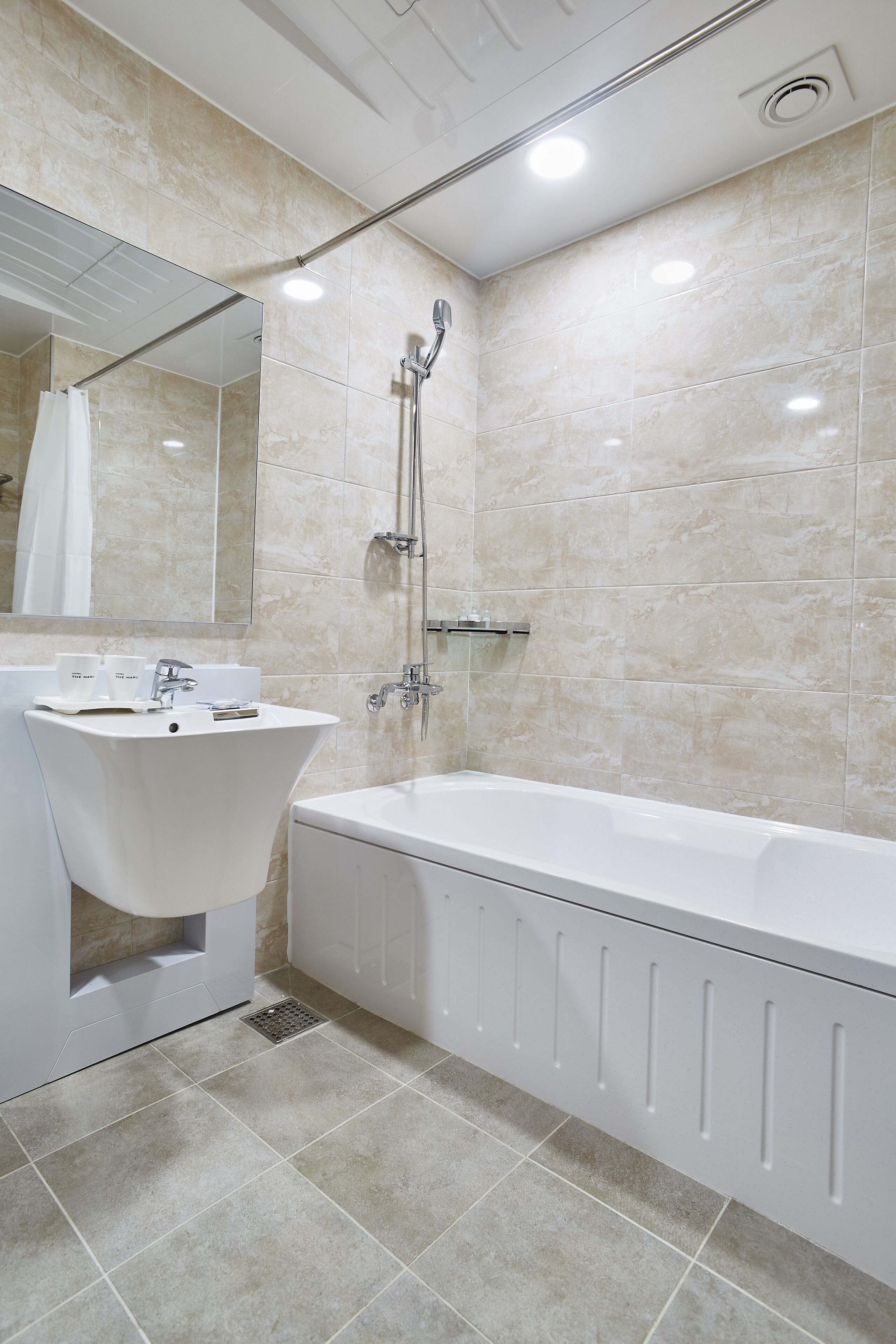superior twin room | bathroom | free toiletries, hair dryer, bathrobes, slippers
