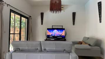 Villa, Private Pool | Living room | Flat-screen TV