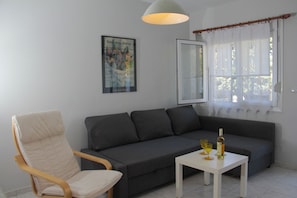 Apartamento | Sala de estar | TV