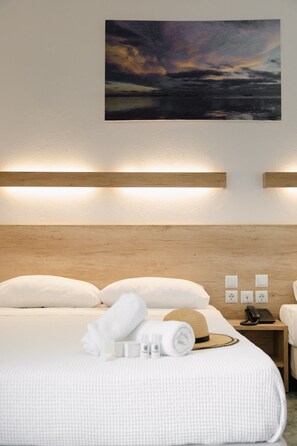 Family Room - Mountain View | Frigobar, quartos à prova de som, Wi-Fi de cortesia, roupa de cama