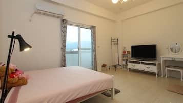 Standard Quadruple Room, Mountain View | Individually decorated, desk, blackout drapes, free WiFi