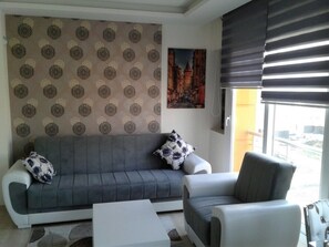 Apartment, 1 Bedroom | Living room | LCD TV - Lara Suit (Mersin)