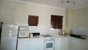 Apartment, 1 Bedroom | Private kitchen - Cozy Executive Apartment in Sandton (Sandton)