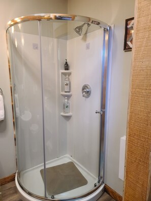 The Nest Cottage | Bathroom | Hair dryer, bathrobes, towels