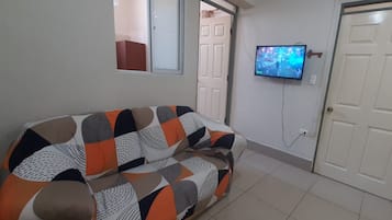 Apartment, 1 Bedroom (Dpto. 1) | Living area | Flat-screen TV