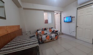 Apartment, 1 Schlafzimmer (Dpto. 1) | Wohnbereich | Flachbildfernseher