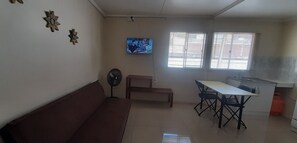 Basic Apartment, 1 Bedroom | Living area | Flat-screen TV - Apart Maxi (Arica)
