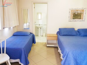 Habitación triple | Ropa de cama hipoalergénica, minibar, cortinas opacas