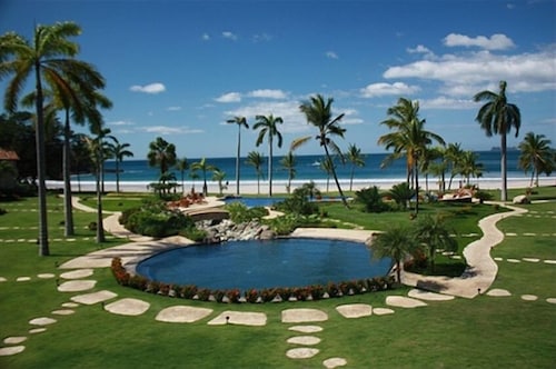 Villa en front de mer sur la plage de Flamingo - Maison privée dans un complexe 5 étoiles