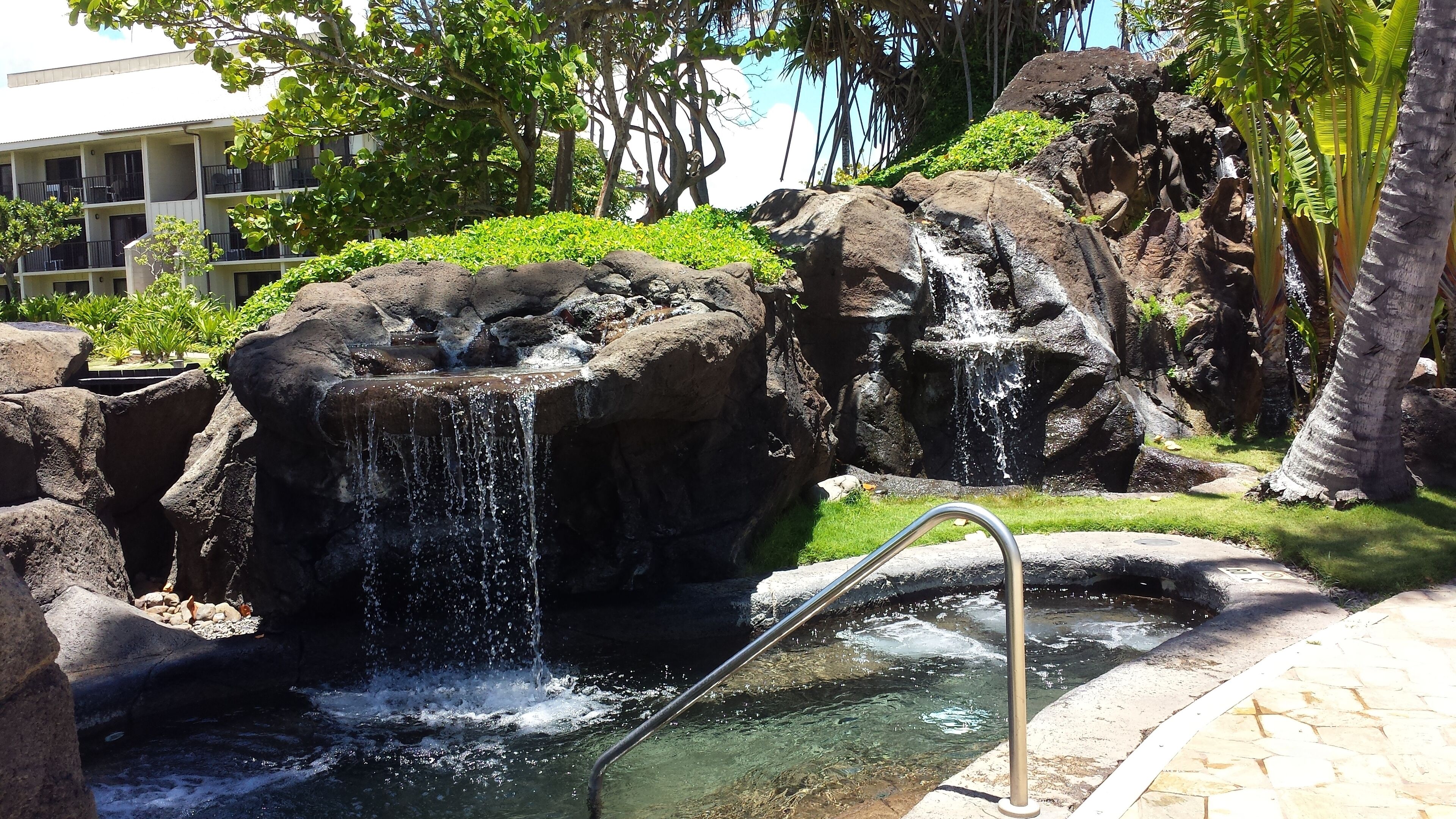 one of the whirlpool spas, adjacent to the pool area.