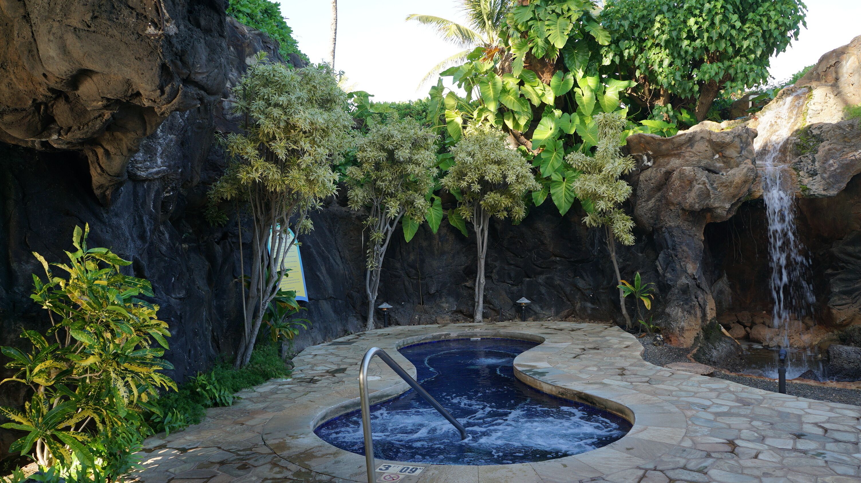 one o0f the two whirlpool spas, set amidst a beautiful setting.