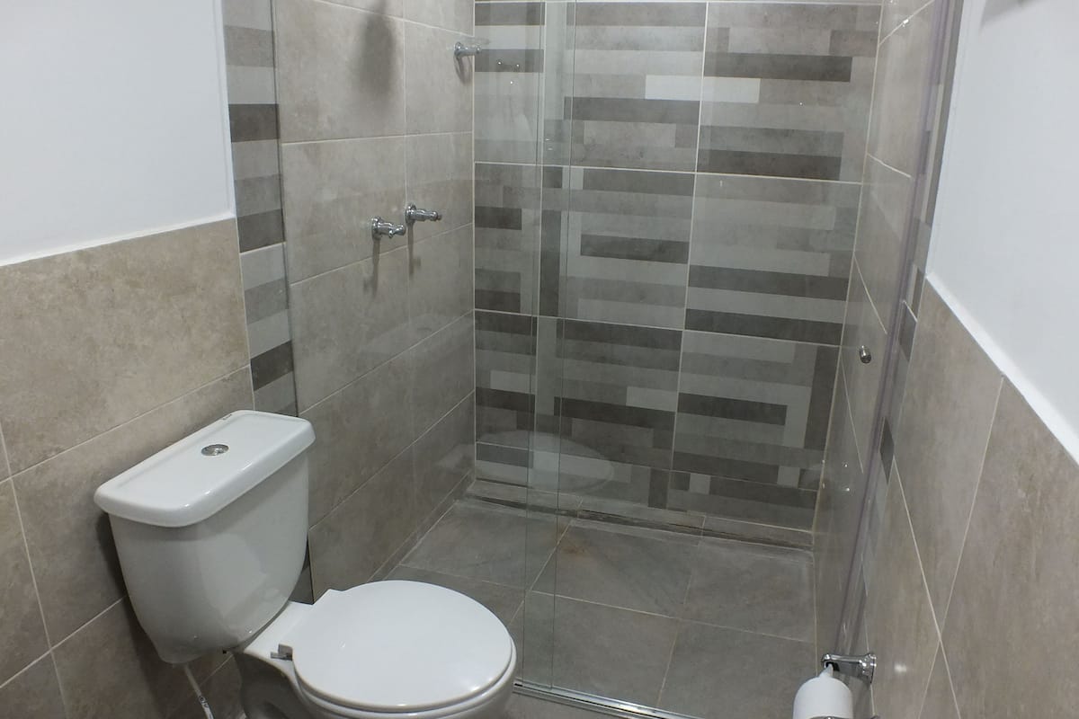 superior double room, 1 queen bed | bathroom | shower, free toiletries, hair dryer, towels