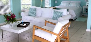 Panoramic Cottage, 1 Bedroom, Ocean View, Beachside | Living room | Flat-screen TV - Dragon Cay Resort (Conch Bar)