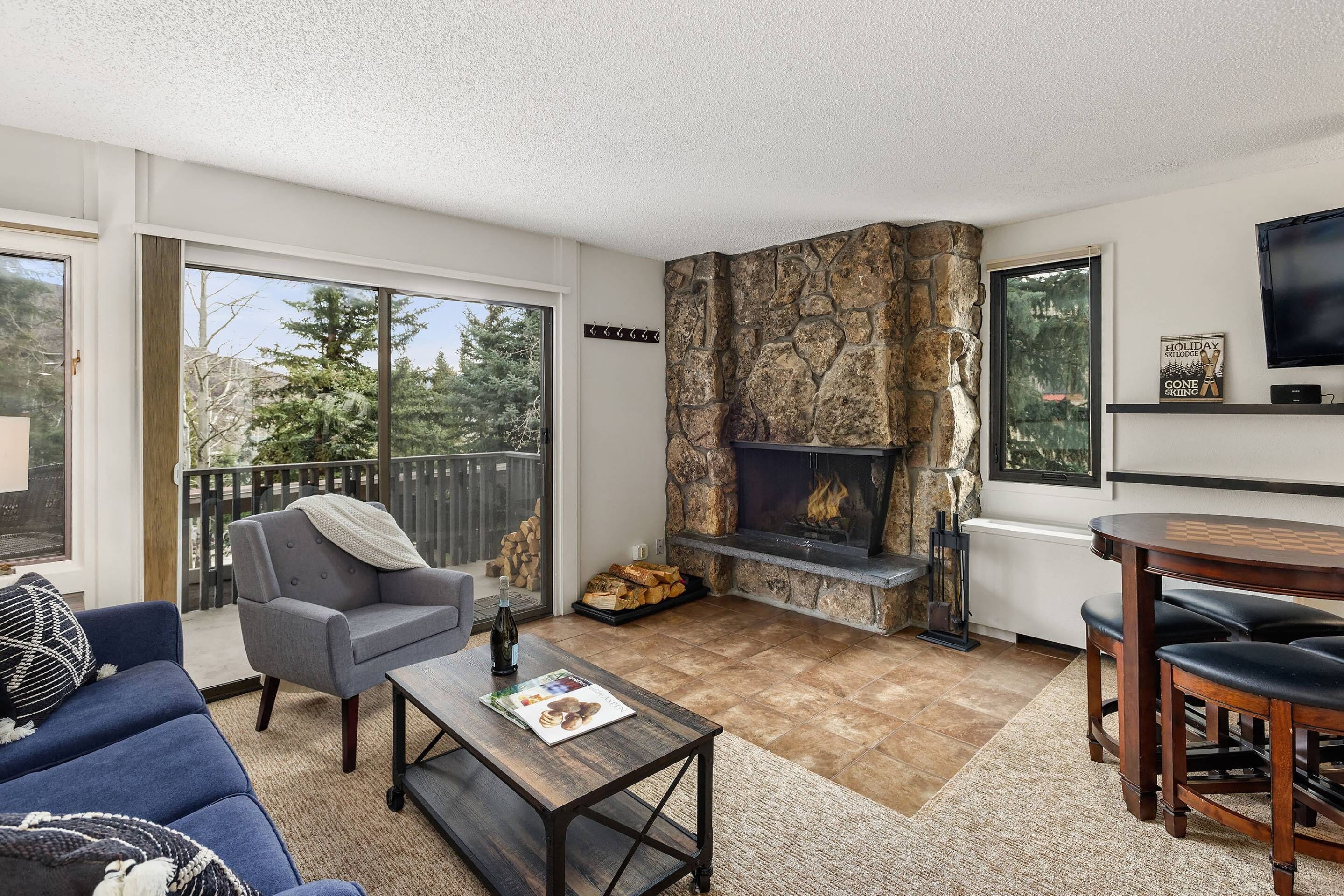 The living area in this one bedroom offers comfortable seating for your group, complete with newly updated furnishings.