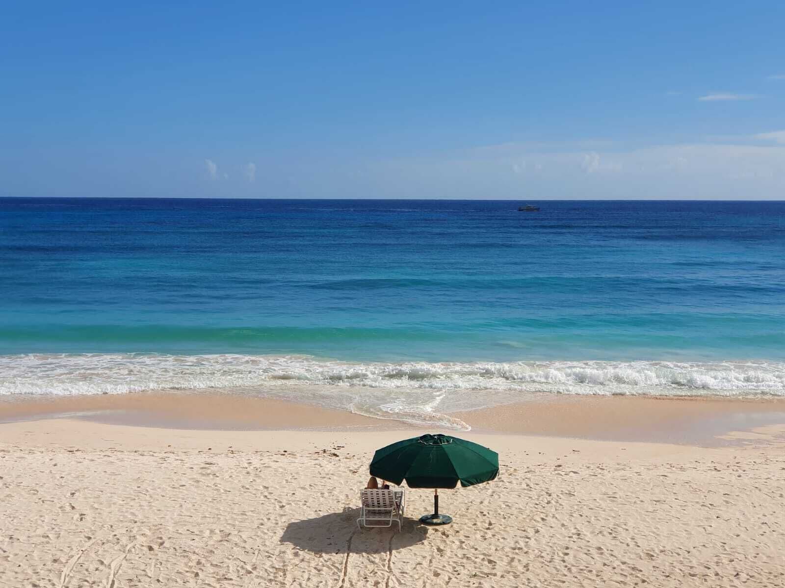 On the beach, sun-loungers, beach towels