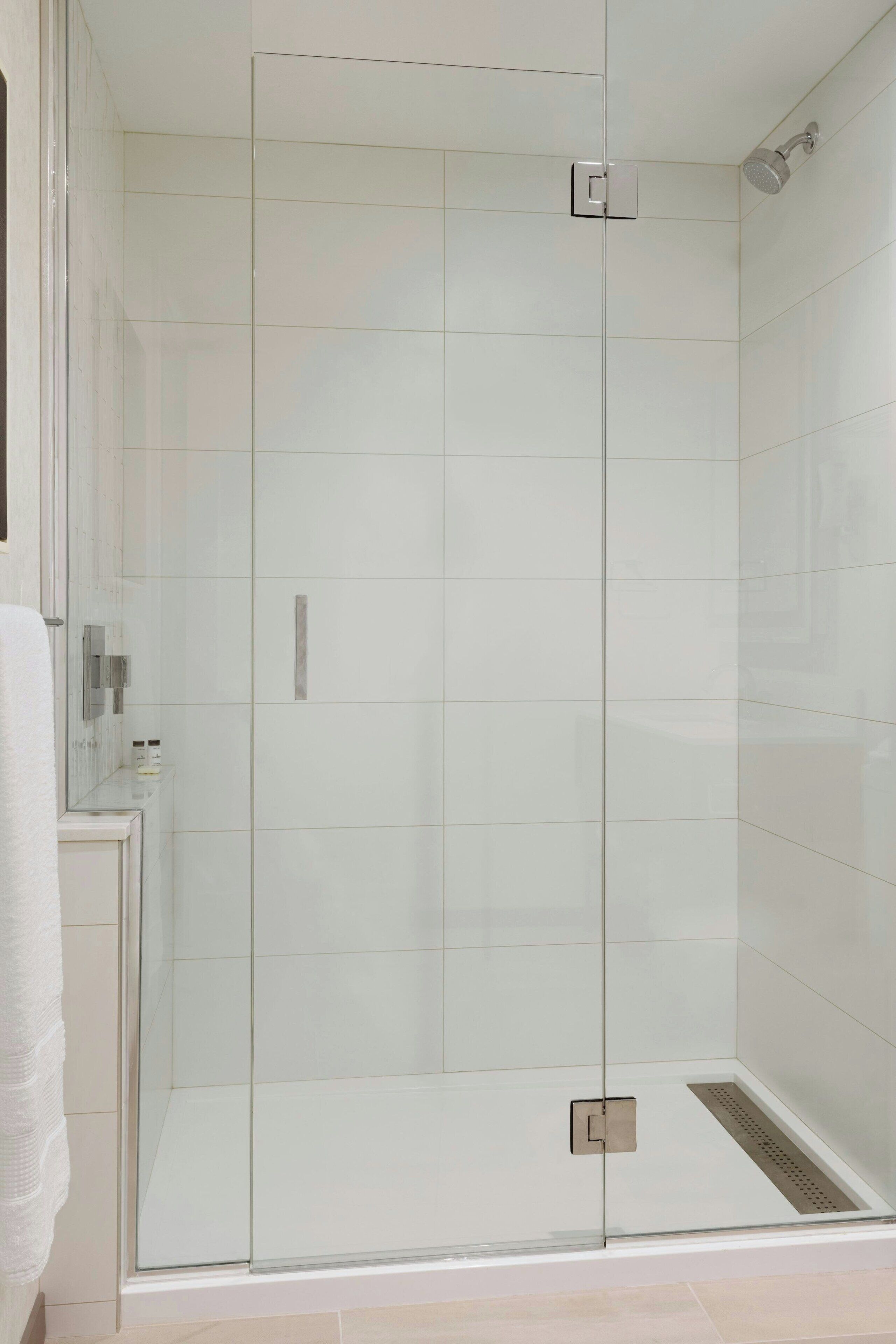 shower, rainfall showerhead, designer toiletries, hair dryer